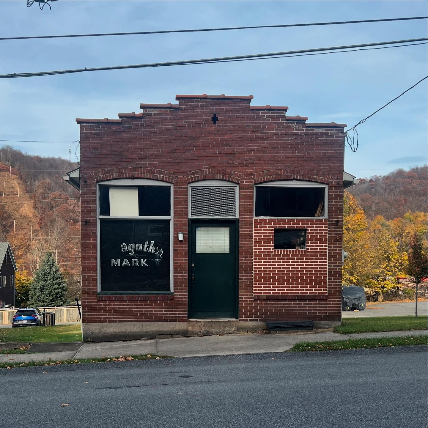 A small shuttered neighborhood market in Johnstown