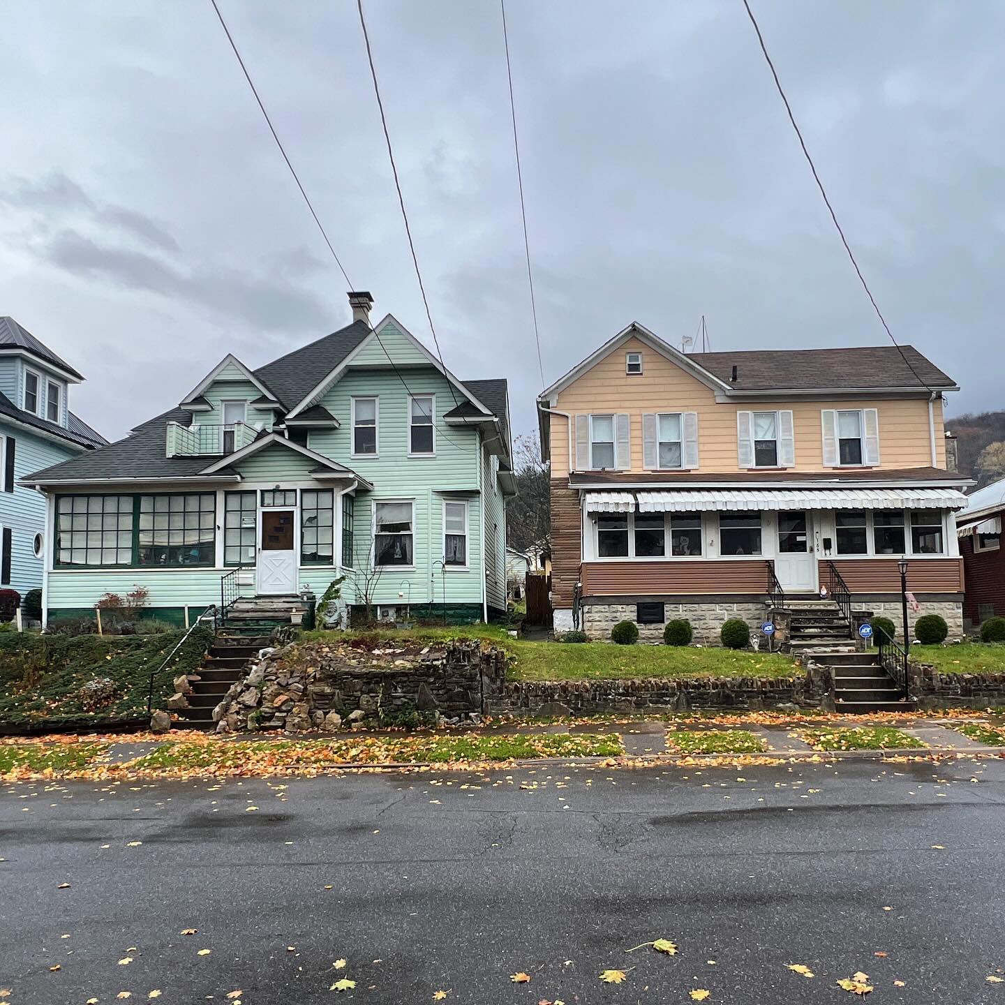Two neighboring houses from different eras in Johnstown's West End